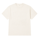 An off-white short-sleeve crewneck t-shirt featuring a large, tonal embossed square pattern on the front, displayed against a solid white background.